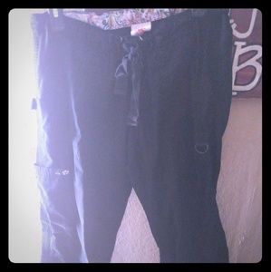 Black scrub pants.